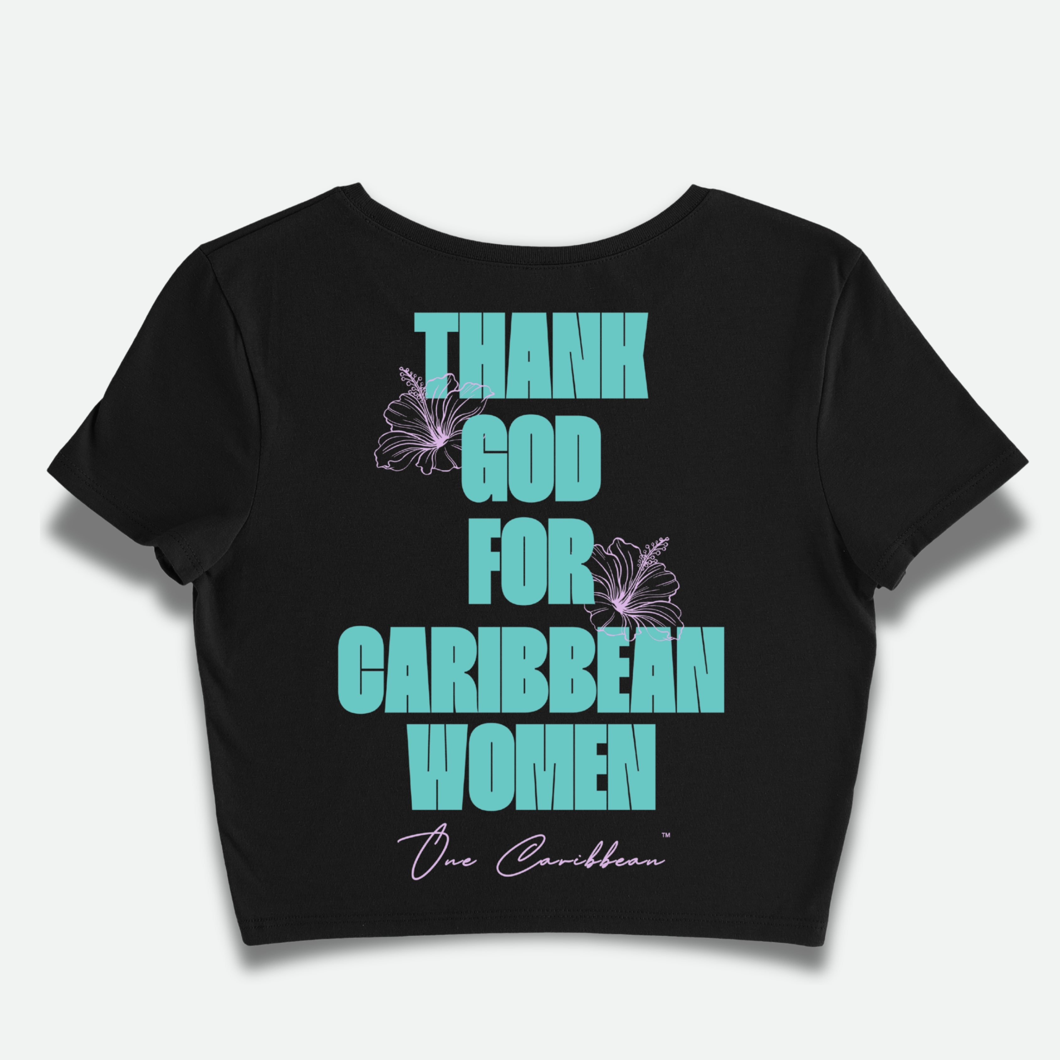 A black cropped tee with the text 'THANK YOU GOD FOR CARIBBEAN WOMEN' printed in green and purple on the front.