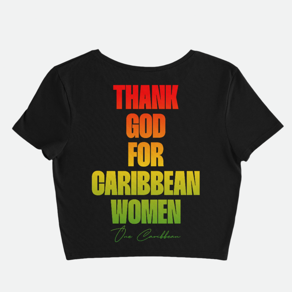 A white crop top with the text 'THANK GOD FOR CARIBBEAN WOMEN' printed in red, gold, and green gradient.